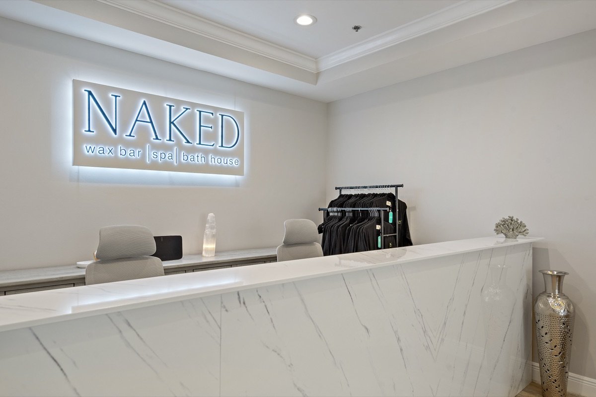 The NAKED front desk and reception at our Baton Rouge bar